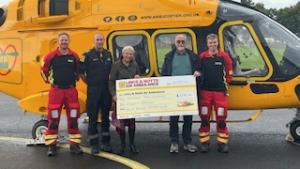 President Gerry and Gail present £2280 cheque to Air Ambulance from the Art and Craft Fair